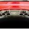 American Car Craft 1997-2004 C5/Z06 Corvette- Exhaust Filler Panel for Stock Exhaust, Anniv. Emblem, Stainless Steel 032002
